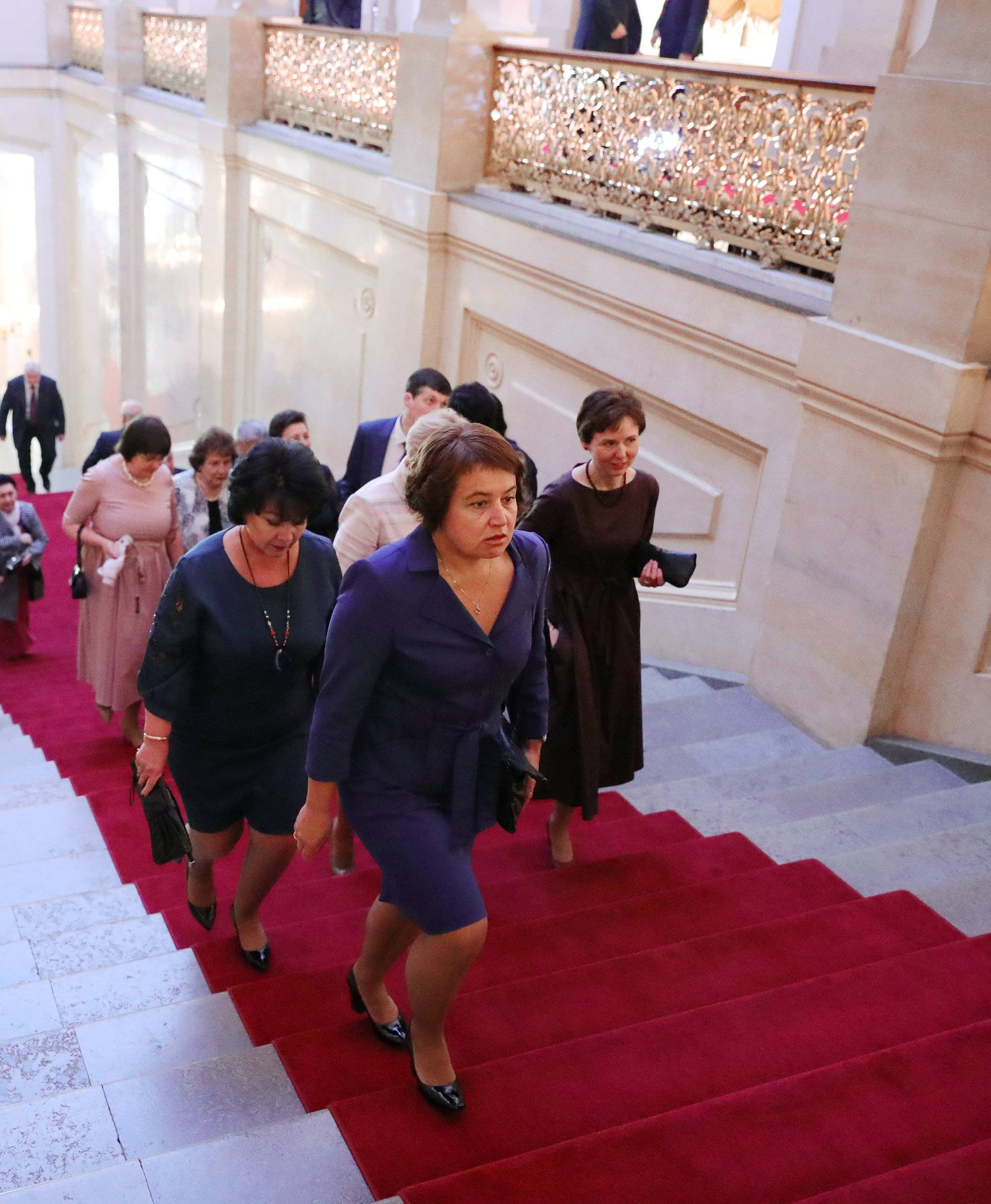 Guests arrive to attend a ceremony inaugurating Vladimir Putin as President of Russia at the Kremlin in Moscow