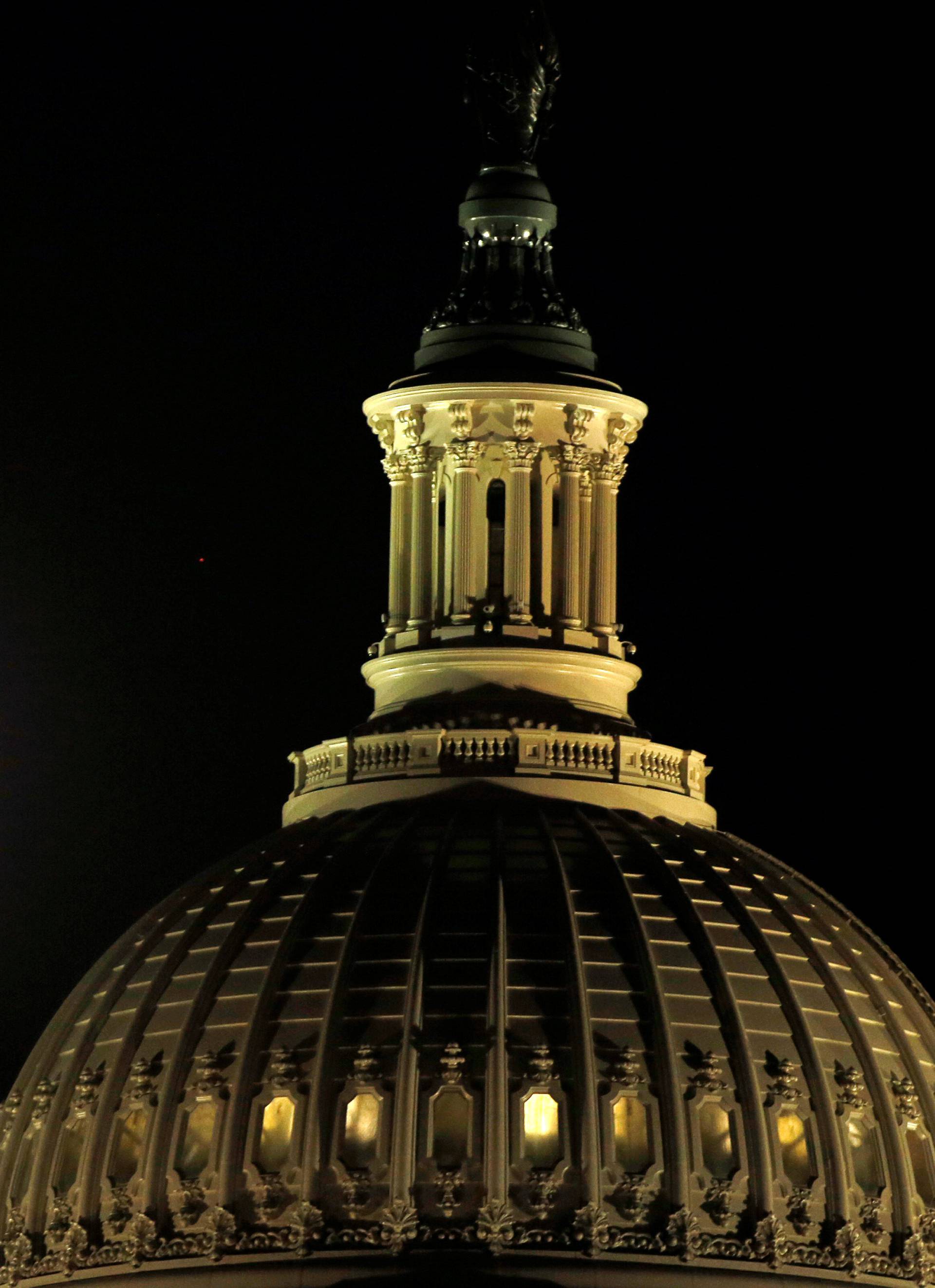 Supermoon rises over US Capitol dome in Washington