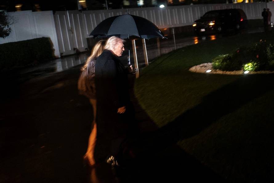 U.S. President Donald Trump and First Lady Melania Trump depart the White House en route to Florida, in Washington