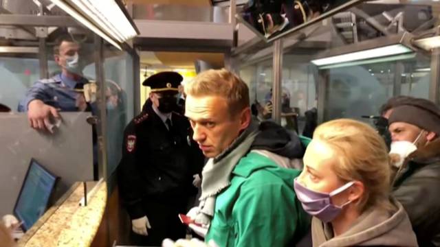 FILE PHOTO: Police officers detain Russian opposition leader Alexei Navalny in Moscow