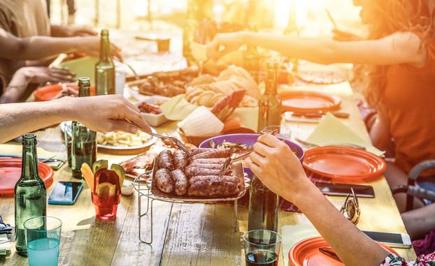 Group,Of,Happy,Friends,Eating,And,Drinking,Beers,At,Barbecue