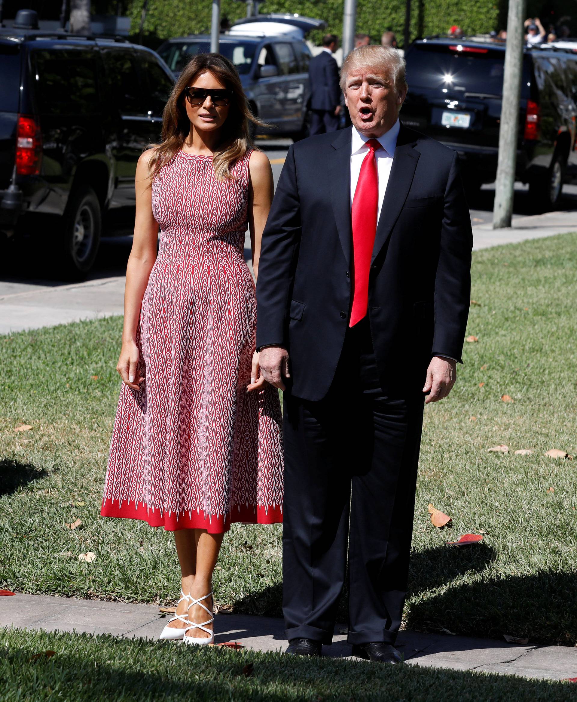 President Donald Trump and first lady Melania Trump arrive for the Easter service at Bethesda-by-the-Sea Episcopal Church in Palm Beach