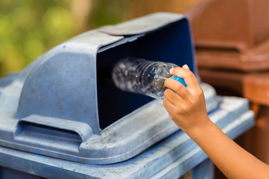 Child Drop the Plastic Bottle