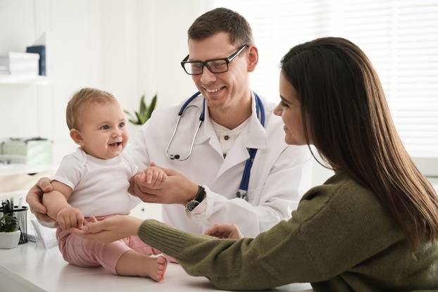 Mother,With,Her,Cute,Baby,Visiting,Pediatrician,In,Clinic