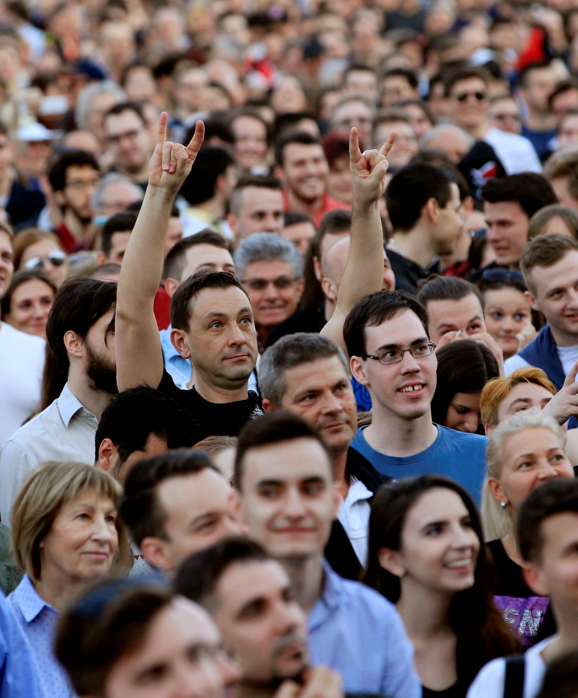 People attend a protest against the government of Prime Minister Viktor Orban in Budapest