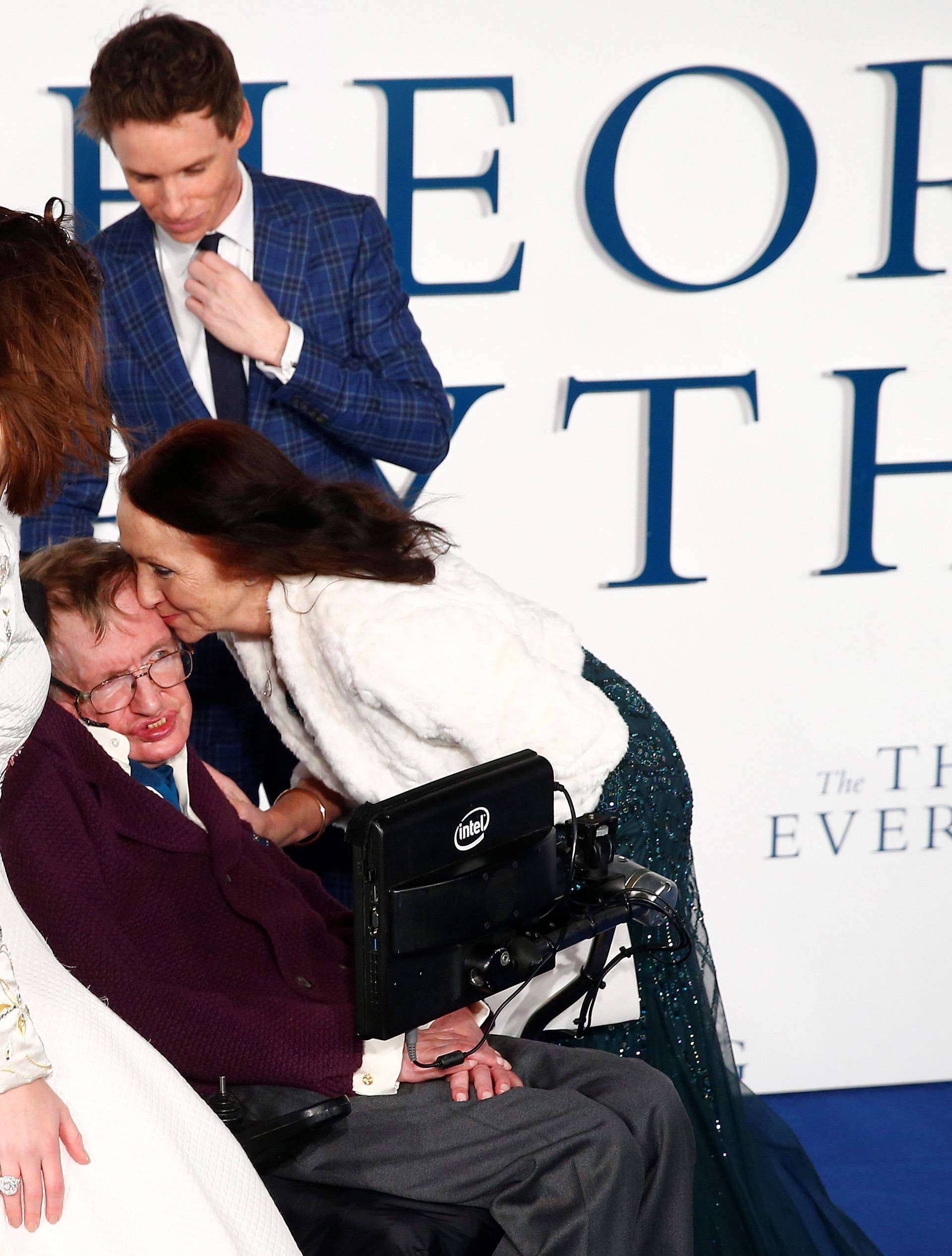 FILE PHOTO: Jane Wilde Hawking kisses her ex-husband Stephen Hawking as she arrives at the UK premiere of the film "The Theory of Everything" at a cinema in central London