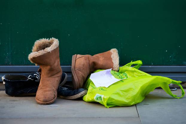 Shoes and personal belongings are seen near the Manchester Arena in central Manchester, Britain