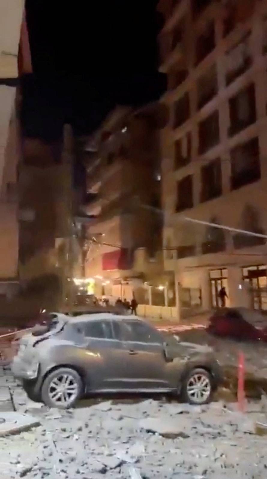 Debris from a damaged residential building, as Israel announced the launch of strikes on Lebanon, in Beirut