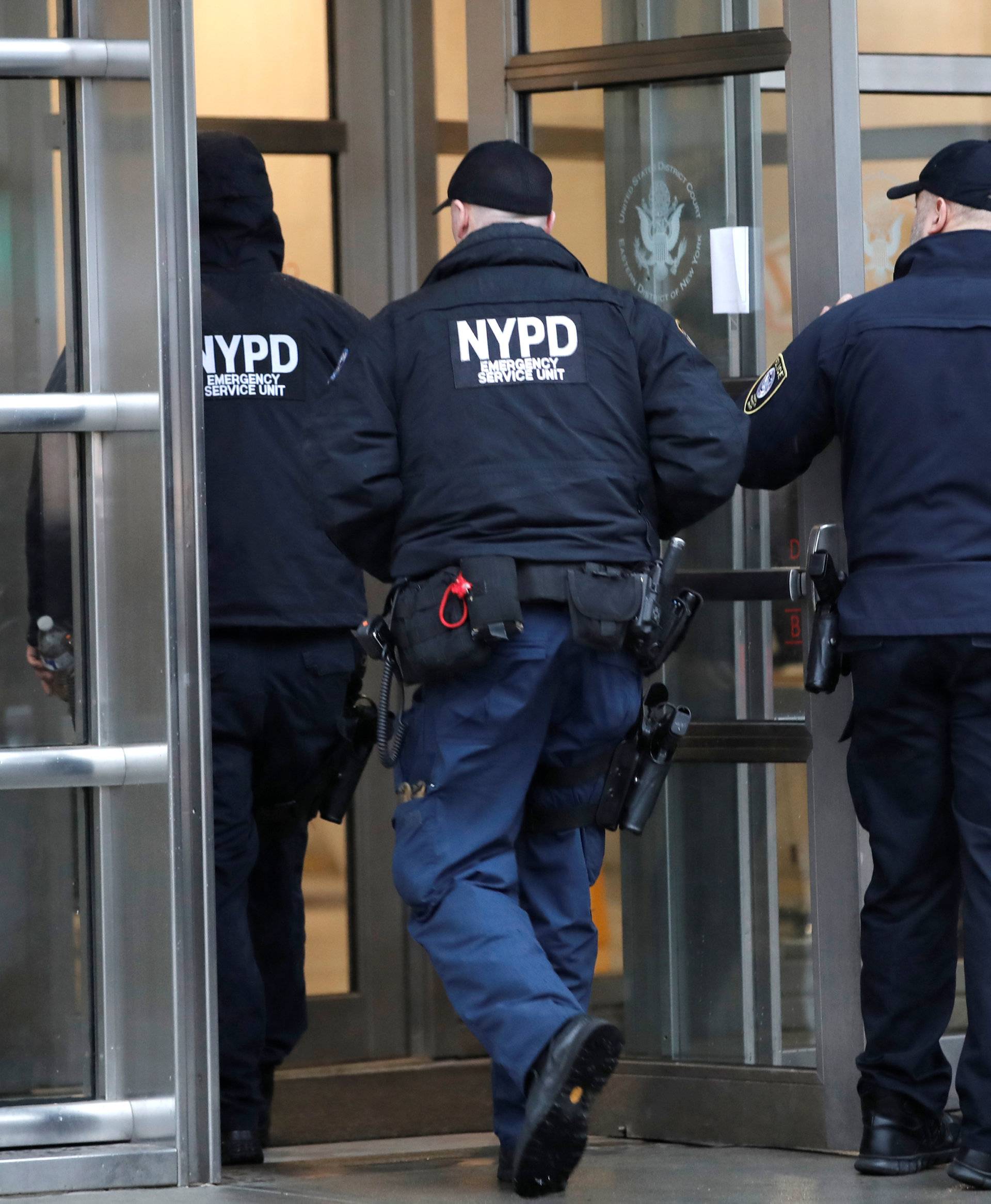 Police enter the Brooklyn Federal Courthouse ahead of start of the trial of Joaquin Guzman, the Mexican drug lord known as "El Chapo," in New York