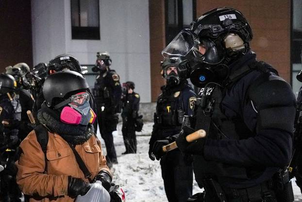 Protest outside the hotel where Bovino, who has been removed from his role, is reportedly staying, in Maple Grove