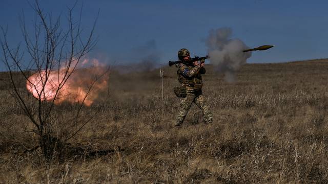 Ukrainian serviceman fires with a RPG-7 anti-tank grenade launcher during a military exercise in Zaporizhzhia region