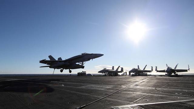 Onboard a U.S. aircraft carrier in times of Ukraine/Russia tensions