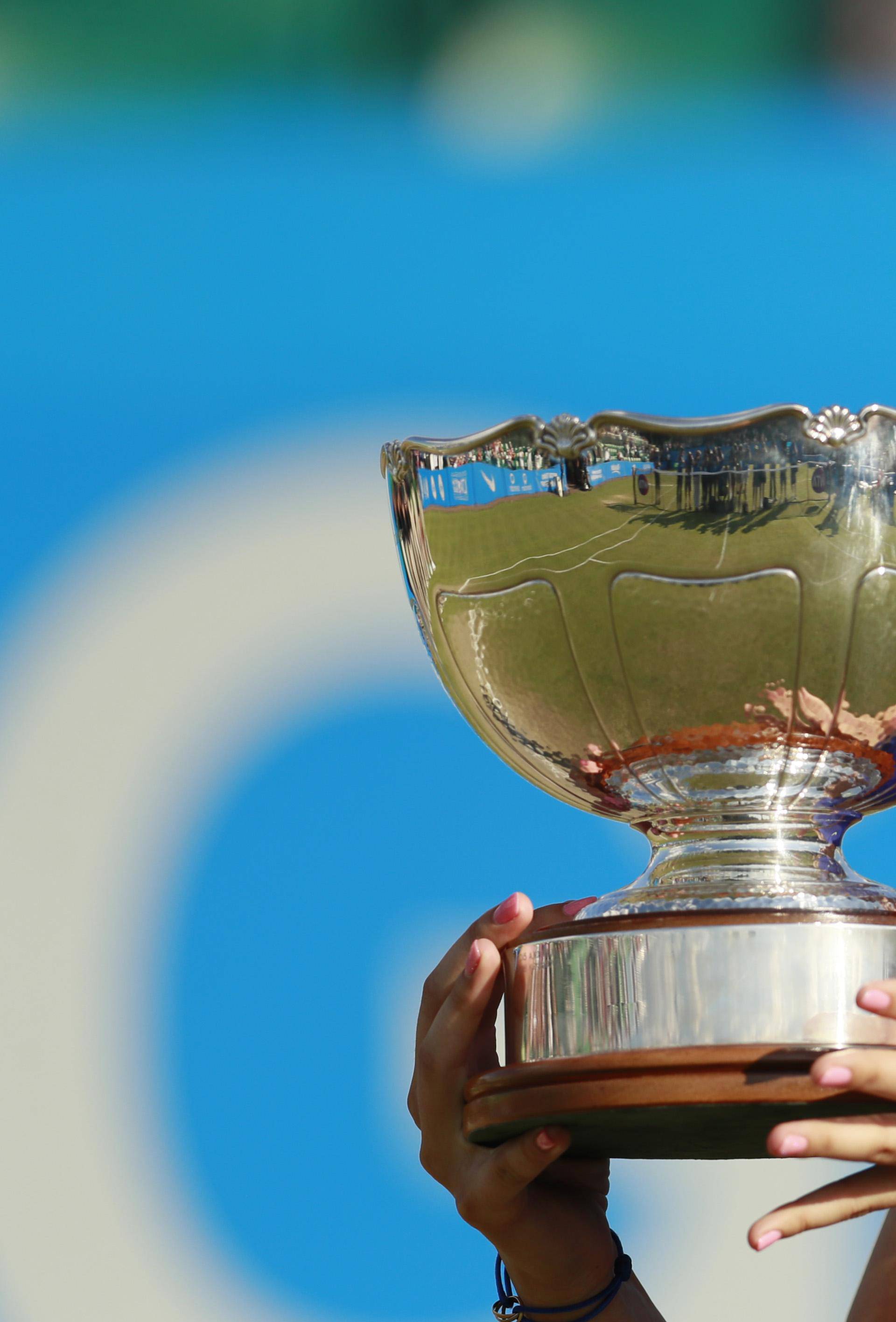 Croatia's Donna Vekic celebrates winning the final with the trophy