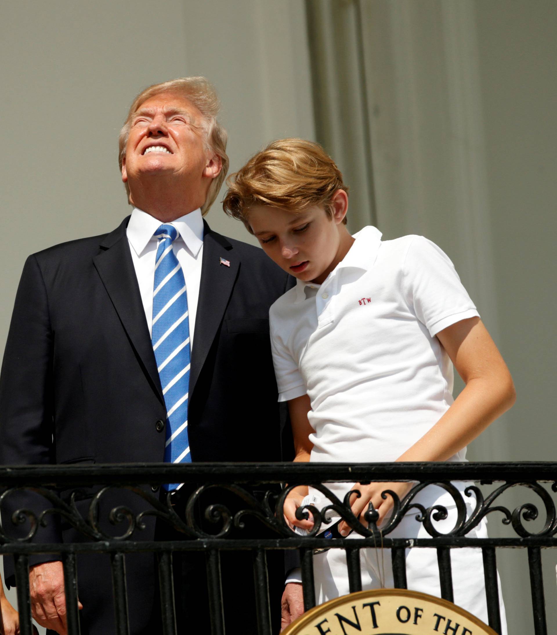 U.S. President Trump and family watch the solar eclipse from the White House in Washington