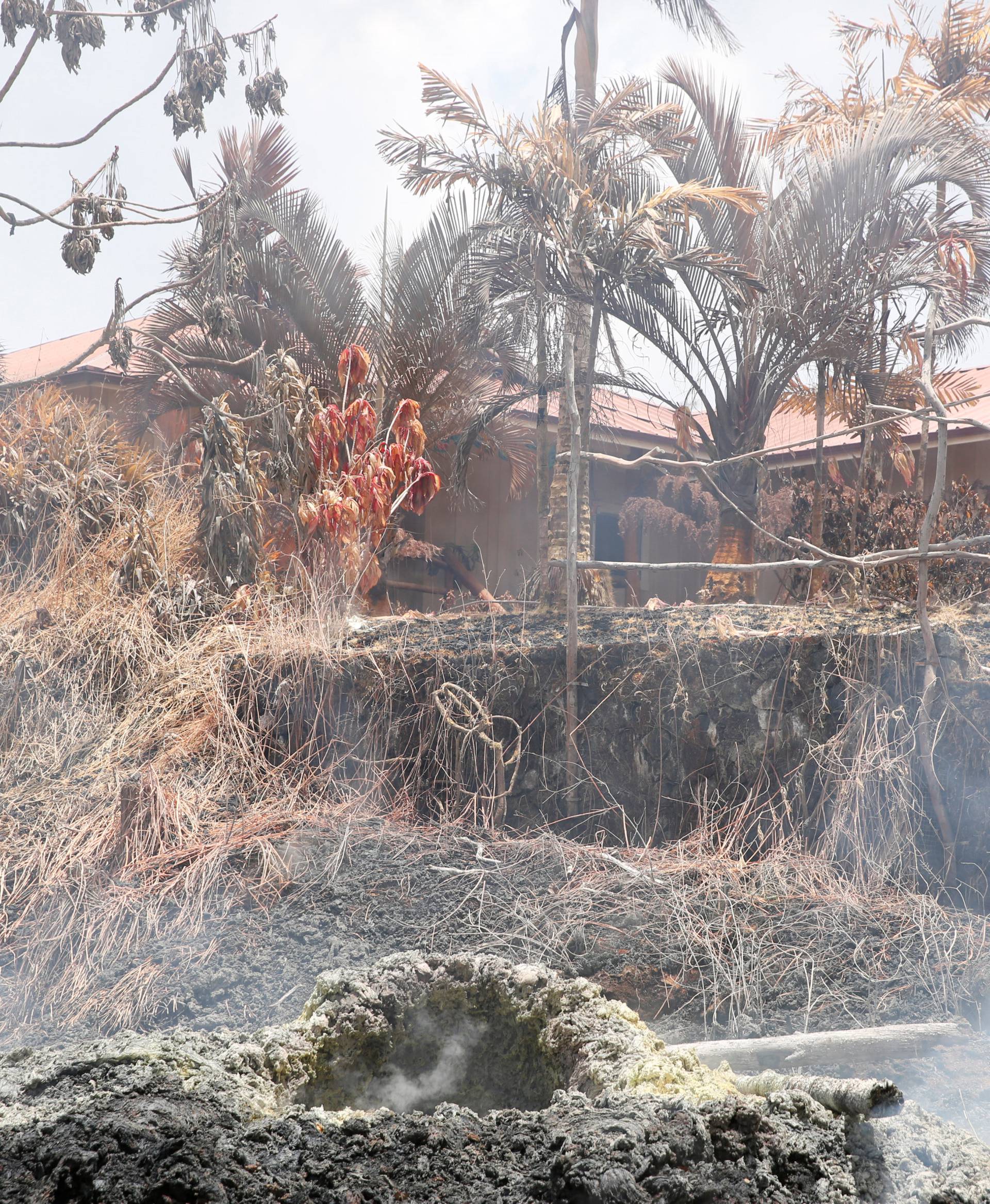 Volcanic gases rise from a fissure in the Leilani Estates subdivision