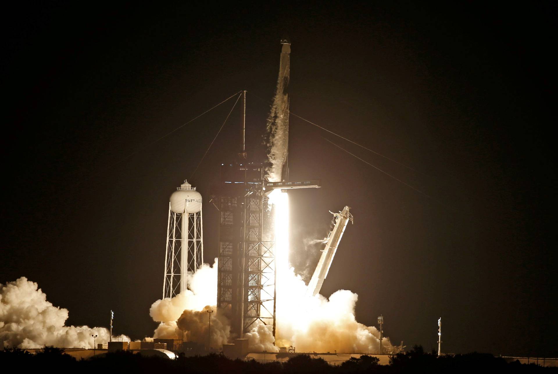 A SpaceX Falcon 9 rocket with the Crew Dragon capsule lifts off from Pad 39A on the Inspiration 4 civilian crew mission at the Kennedy Space Center in Cape Canaveral