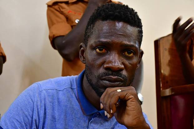 Ugandan presidential candidate Robert Kyagulanyi also known as Bobi Wine sits inside the courtroom in Iganga