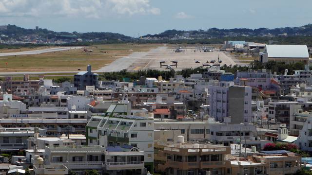 Osprey military aircraft are seen at the U.S. Futenma airbase in Ginowan