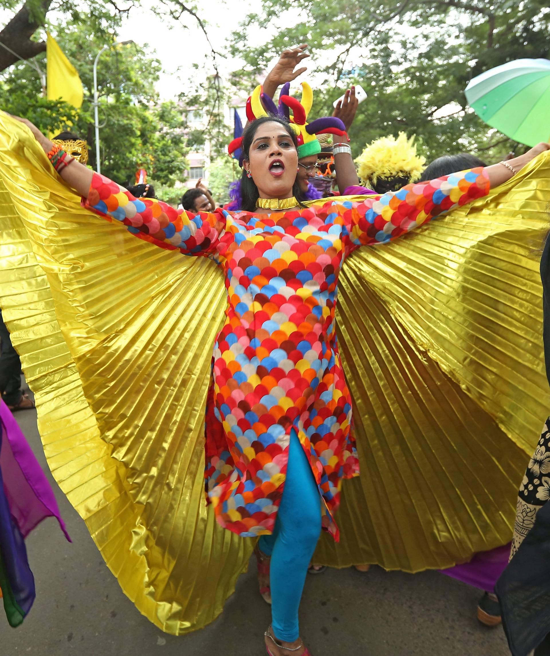 Participants dance during a gay pride parade promoting lesbian, gay, bisexual and transgender rights, in Chennai