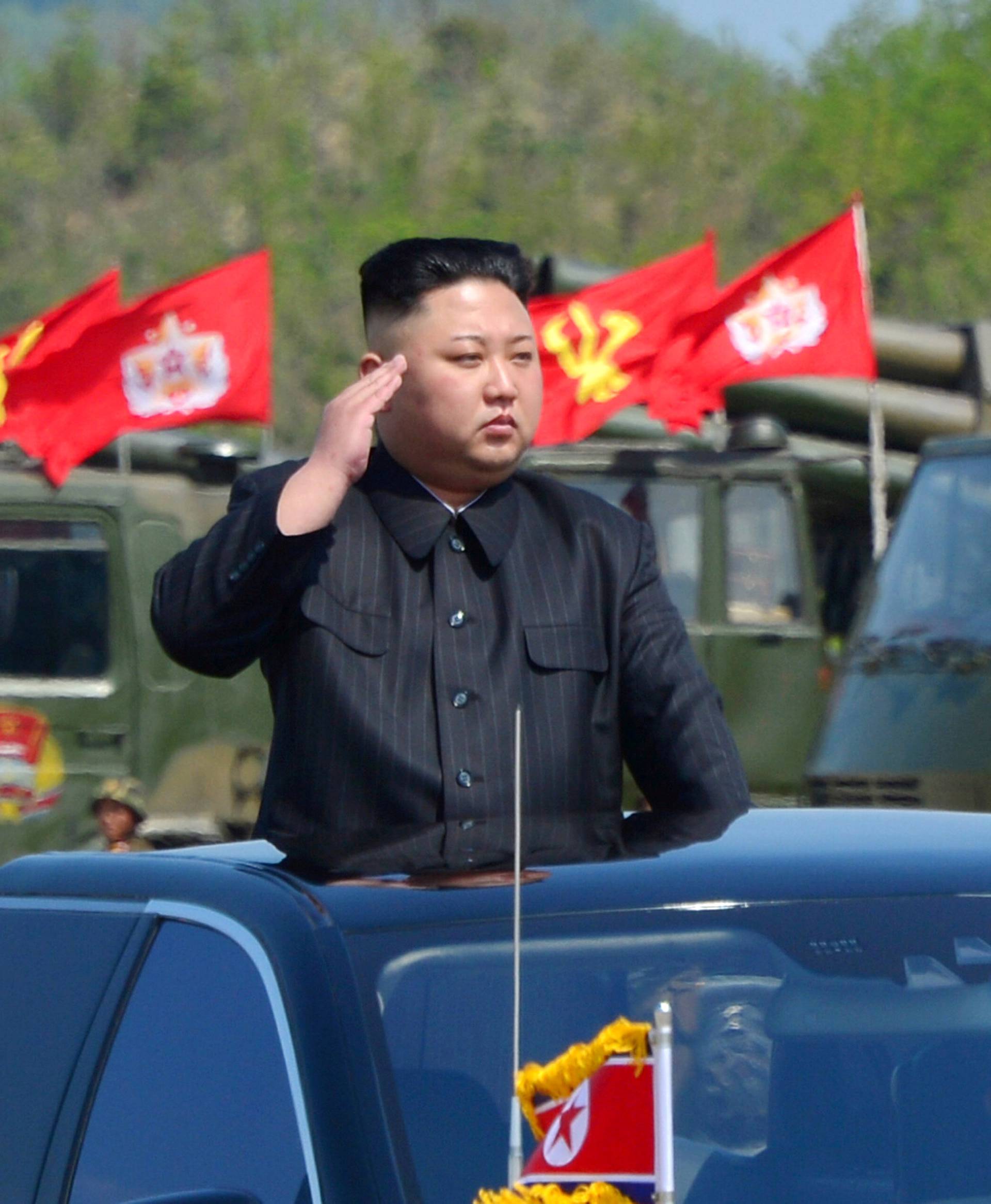 FILE PHOTO: North Korea's leader Kim Jong Un watches a military drill marking the 85th anniversary of the establishment of the Korean People's Army