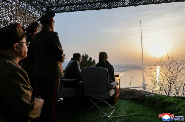 North Korean leader Kim Jong Un oversees test launches of upgraded short-range ballistic missiles in North Korea