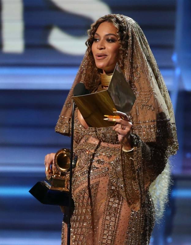 Beyonce accepts the Grammy for Best Urban Contemporary Album for "Lemonade" at the 59th Annual Grammy Awards in Los Angeles
