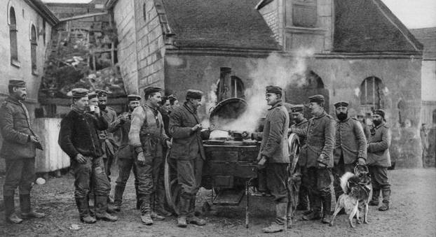 A German army field kitchen in a French village, World War I, 1915.
