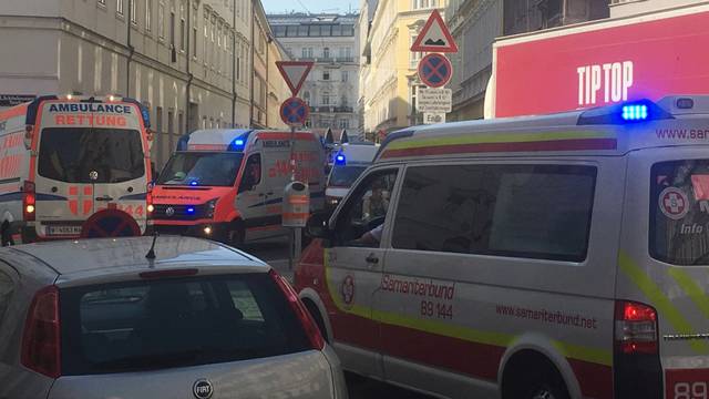 Ambulances are seen near the site of a partial building collapse in Vienna