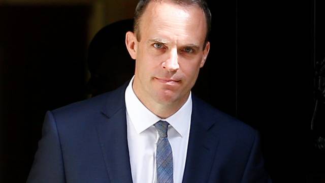 Britain's newly appointed Secretary of State for Exiting the European Union Dominic Raab leaves 10 Downing Street in Westminster, London