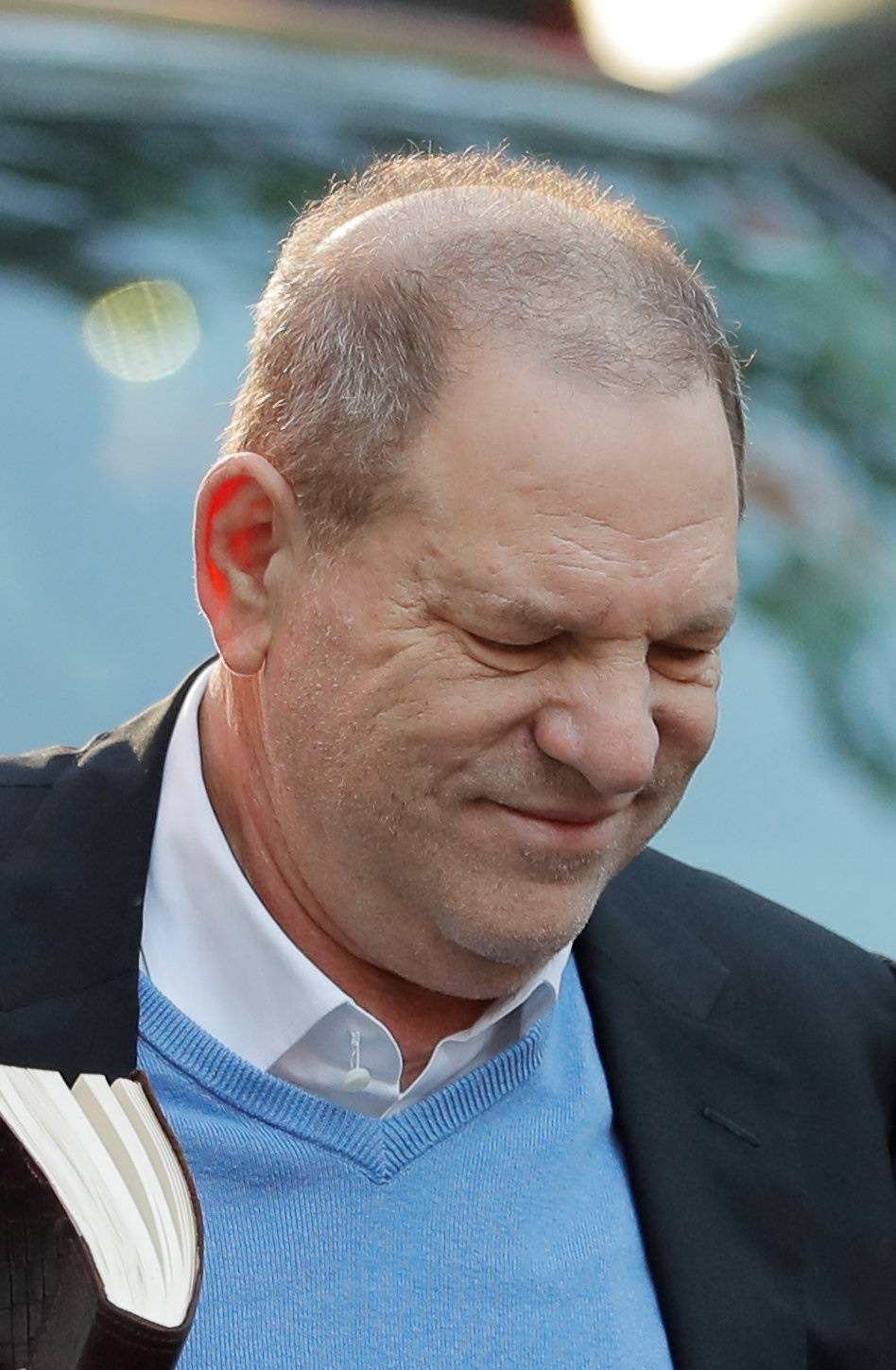 Film producer Harvey Weinstein arrives at the 1st Precinct in Manhattan in New York