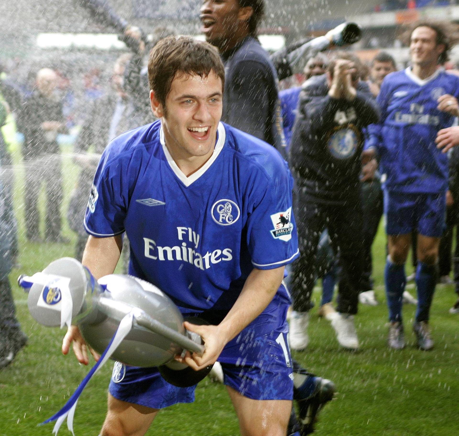 FILE PHOTO: Chelsea's Joe Cole celebrates winning the Premier League title at the Reebok Stadium, Bolton, UK April 30, 2005