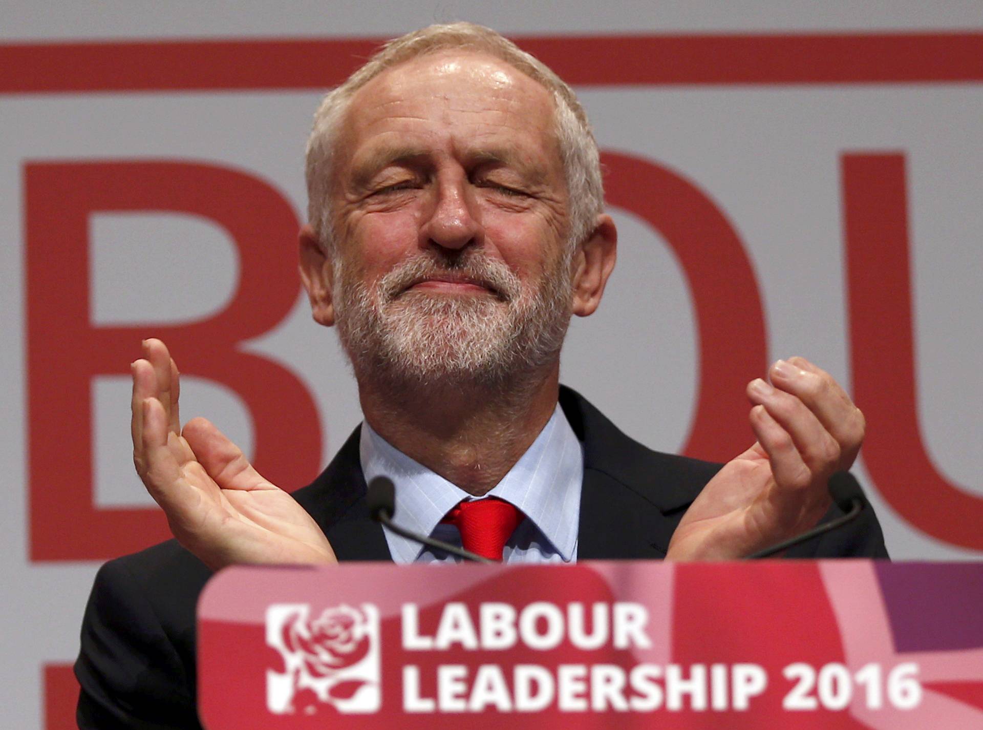 The leader of Britain's opposition Labour Party, Jeremy Corbyn, reacts after the announcement of his victory in the party's leadership election, in Liverpool