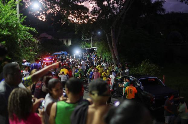 Supporters of Brazilian politician Roberto Jefferson demonstrate close to his house in Comendador Levy Gasparian