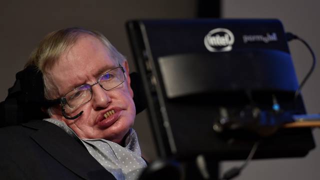 FILE PHOTO: British scientist and theoretical physicist Hawking attends a launch event for a new award for science communication in London