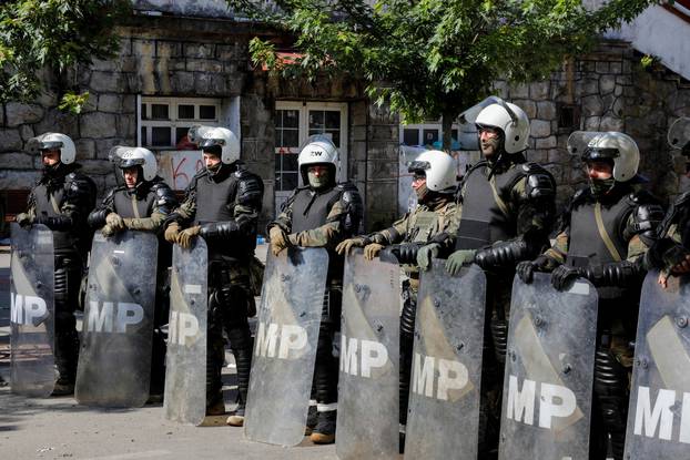 Polish Kosovo Force (KFOR) soldiers guard a municipal office in Zvecan