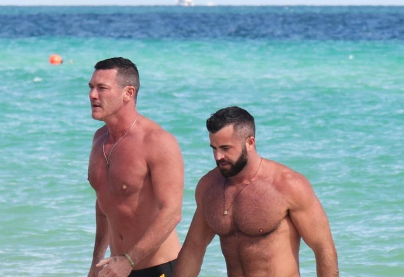 *EXCLUSIVE* Luke Evans hits the beach with his hunky boyfriend Fran Tomas in Miami!