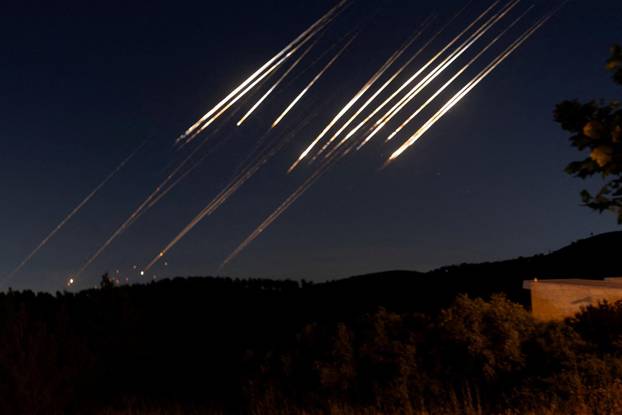 Missiles launched from Iran towards Israel are intercepted, as seen from Neve Ilan