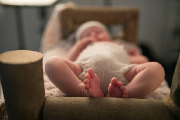 Charming newborn little toddler legs