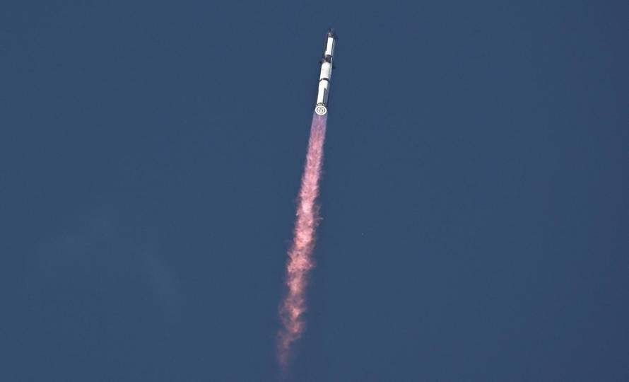 A SpaceX Super Heavy booster carrying the Starship spacecraft lifts off on its 10th test flight