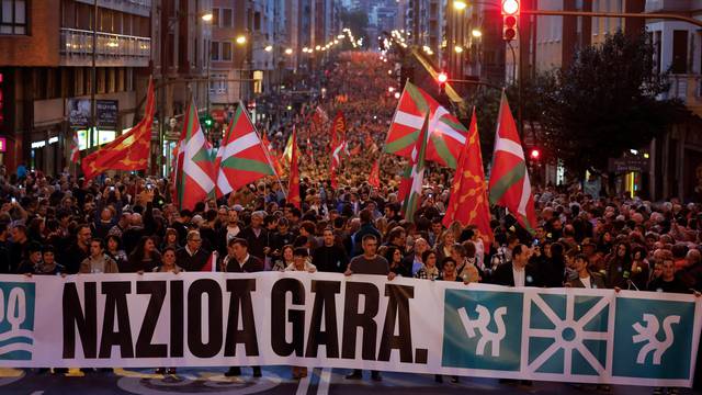 People march behind the slogan "Nazioa gara", 'We are a nation', during a demonstration called by the Basque pro-independence coalition EH Bildu, in Bilbao
