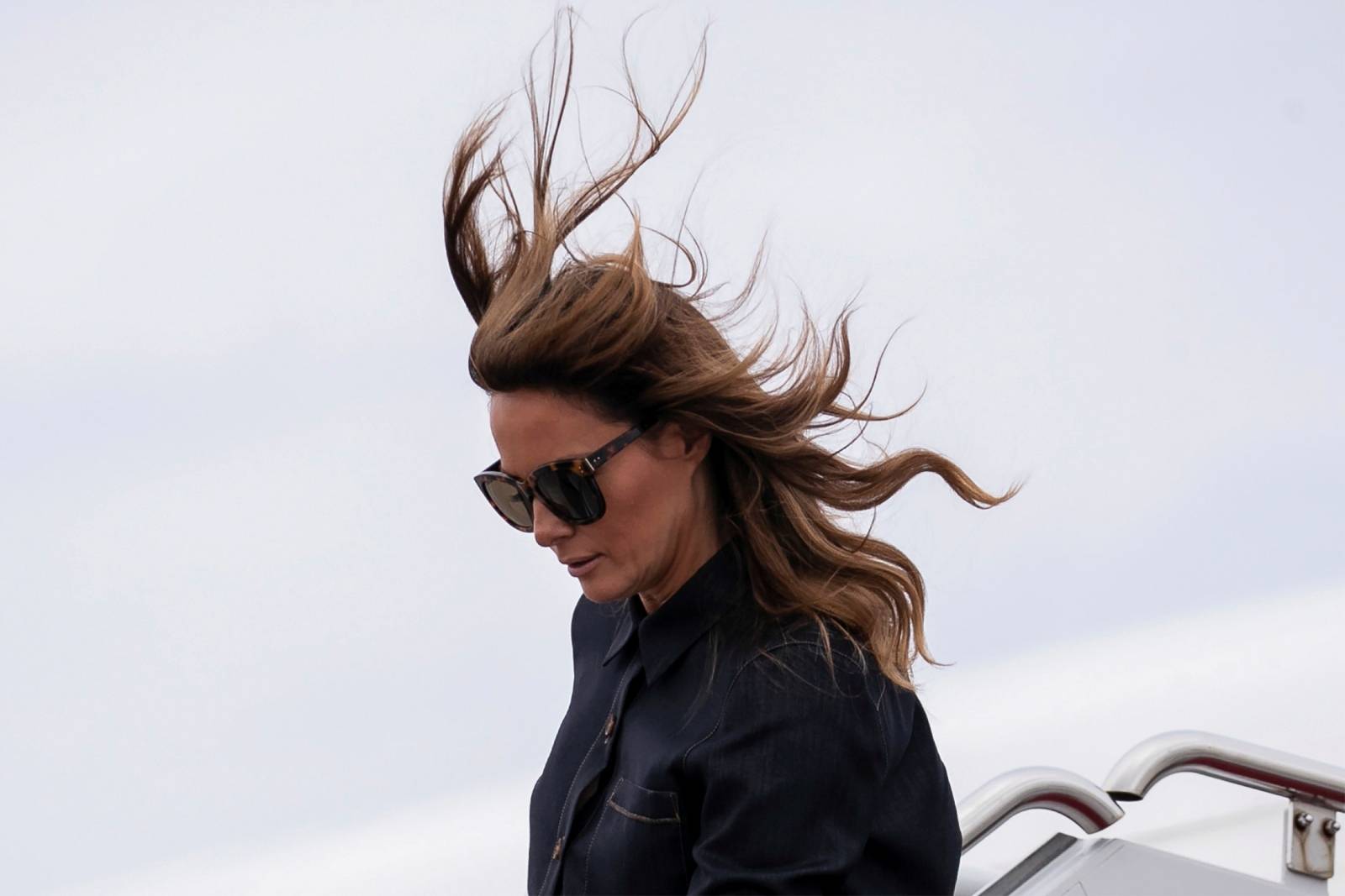 U.S. first lady Melania Trump arrives aboard her plane at Joint Base Andrews in Maryland