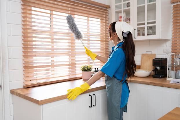 Back,View,Of,Asia,Woman,In,Workwear,Maid,Cleaning,Home