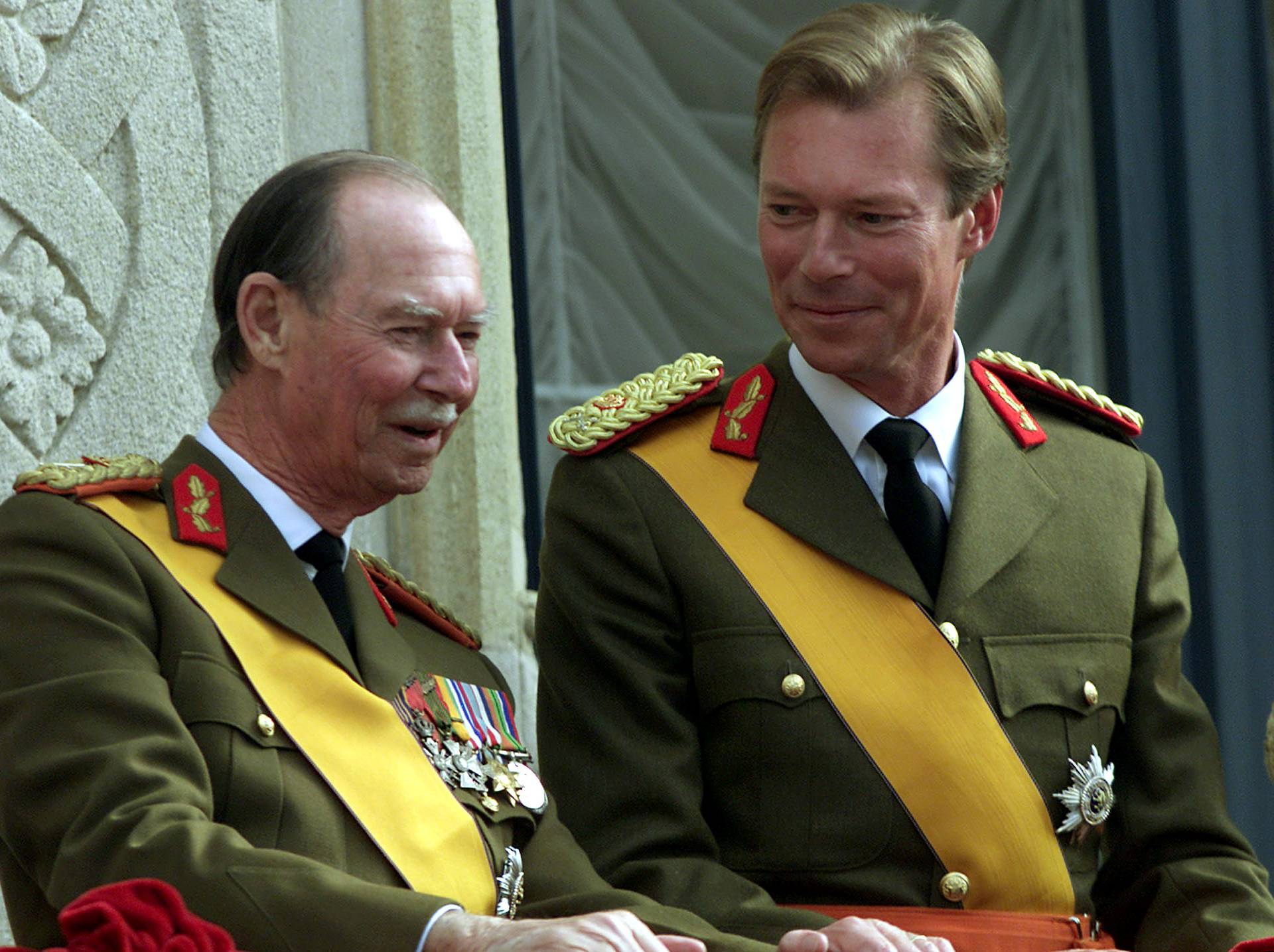 FILE PHOTO: GRAND DUKE HENRI OF LUXEMBOURG SMILES AT HIS FATHER JEAN.