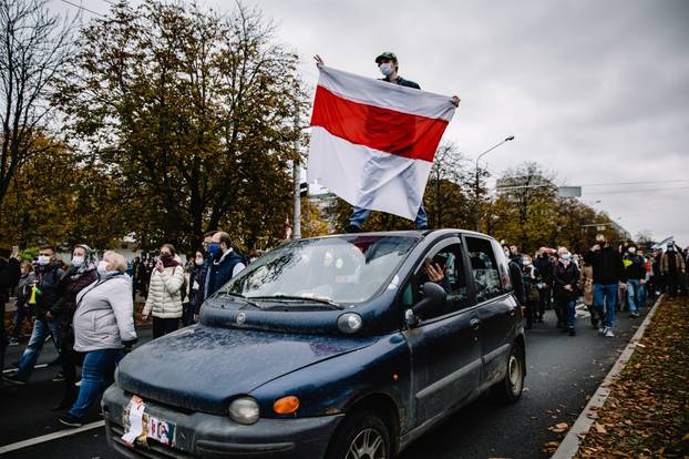 Belarusian opposition supporters hold a rally in Minsk