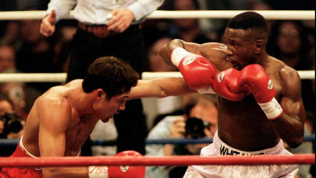 FILE PHOTO: DE LA HOYA LANDS A PUNCH ON WHITAKER DURING WELTERWEIGHT FIGHT