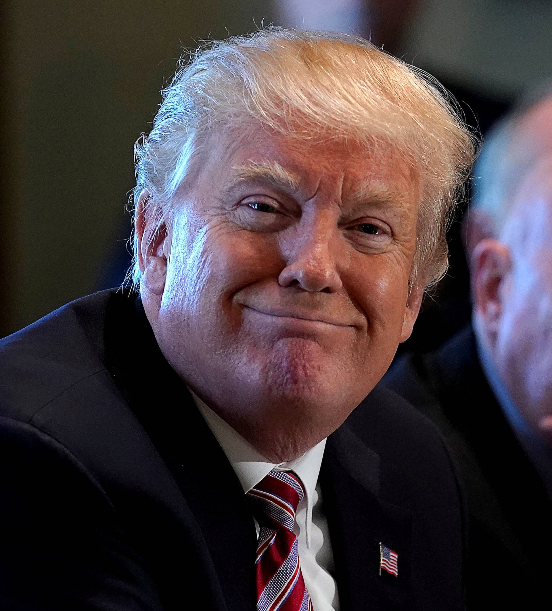 FILE PHOTO: U.S. President Donald Trump holds a meeting on trade with members of Congress at the White House in Washington