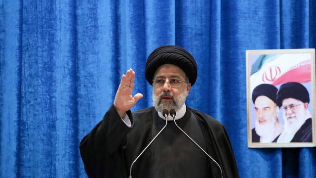 FILE PHOTO: Iranian President Ebrahim Raisi gestures as he speaks at Tehran's Friday prayer on the occasion of the 43rd anniversary of the Islamic Revolution of Iran in Tehran, Iran, February 11, 2022