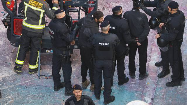 Police officers prepare to evict squatted buildings of Kubo and La Ruina in Barcelona