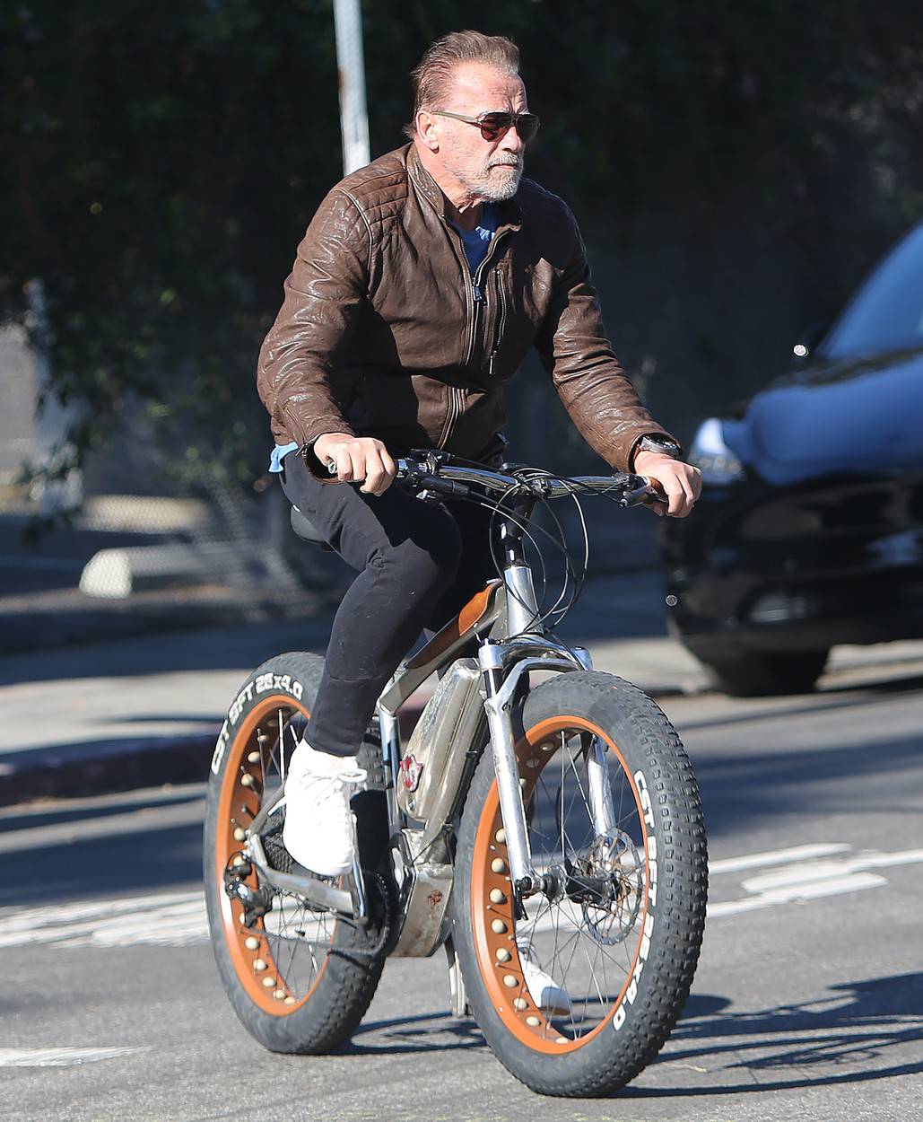 Arnold Schwarzenegger seen after car accident, rides his bike in Santa Monica, Los Angeles, California, USA - 24 Jan 2022