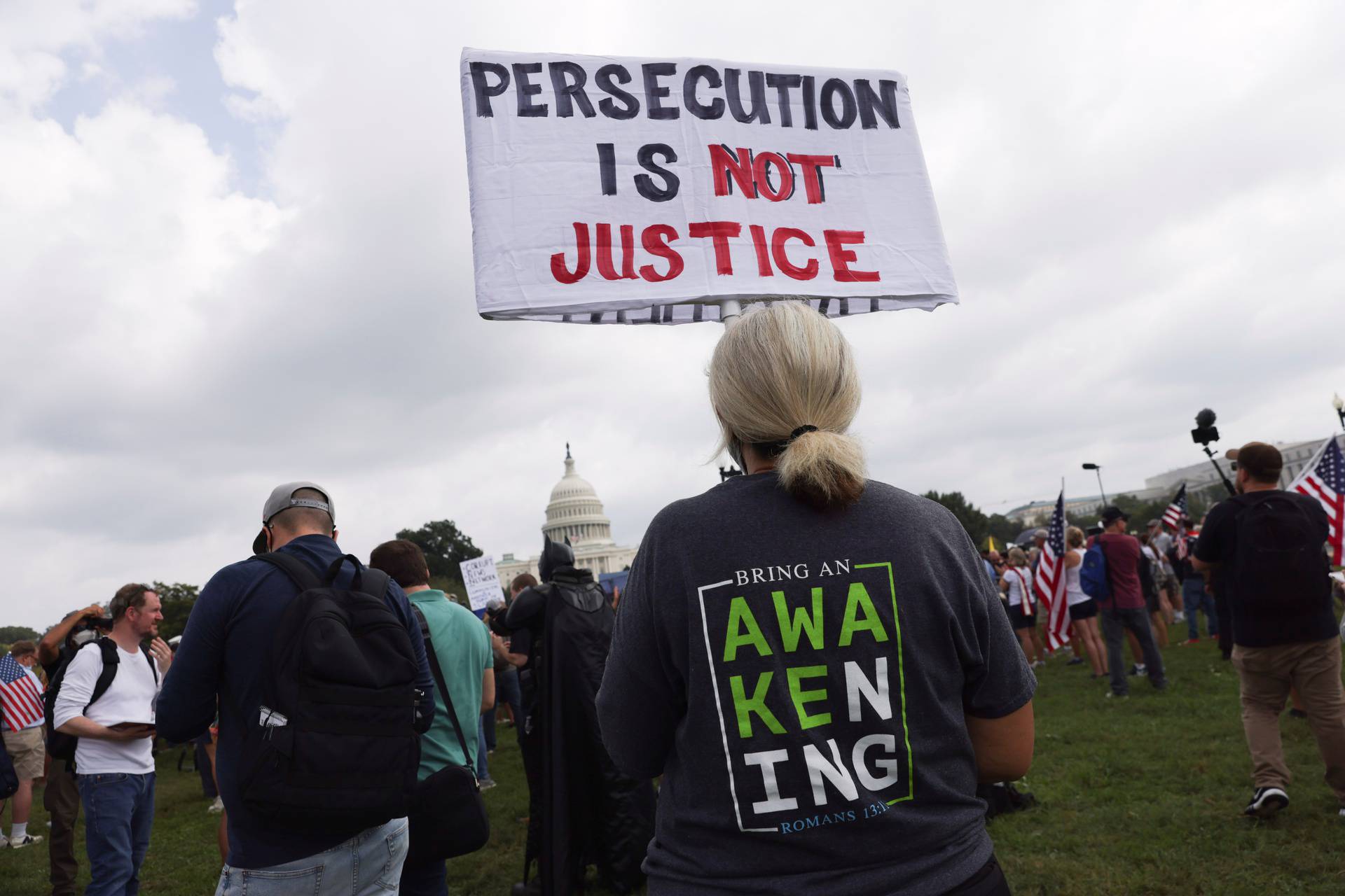 Demonstrators rally in support of January 6 defendants at protest near the U.S. Capitol in Washington